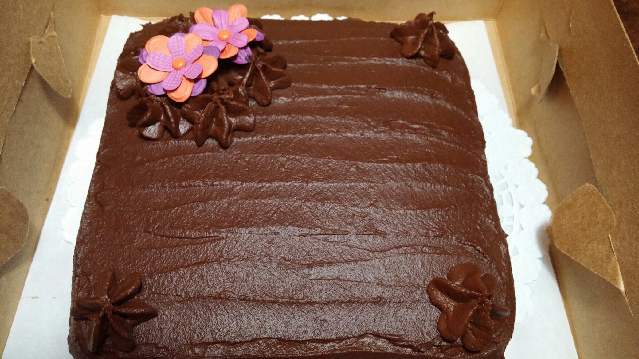 Chocolate cake with chocolate icing. Naturally Dairy free.  Vegan also available for banana or carrot cake with chocolate icing
Gluten free available in all flavors (non certified)